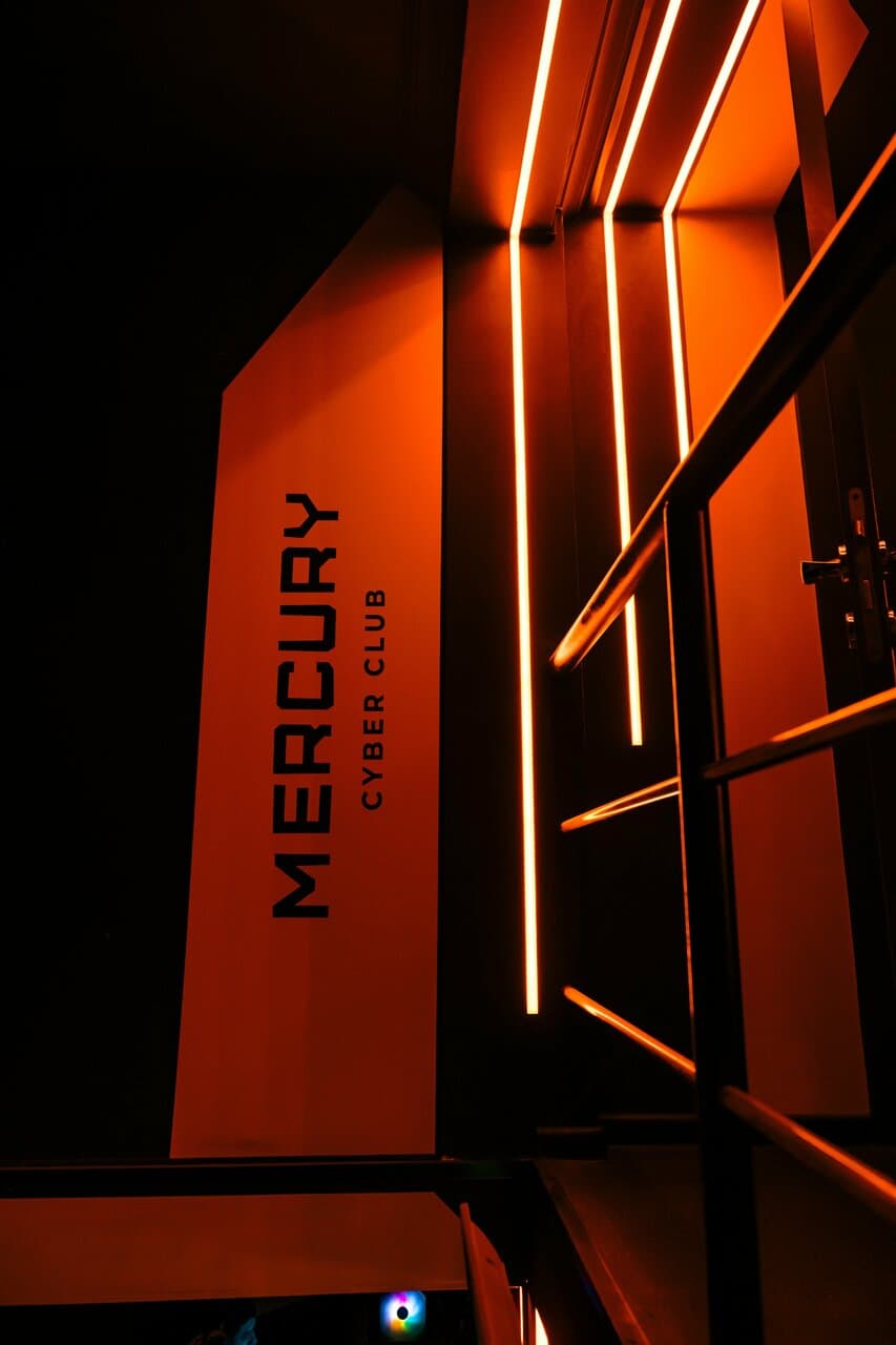 Mercury Cyber Club interior with neon lighting and gaming setups